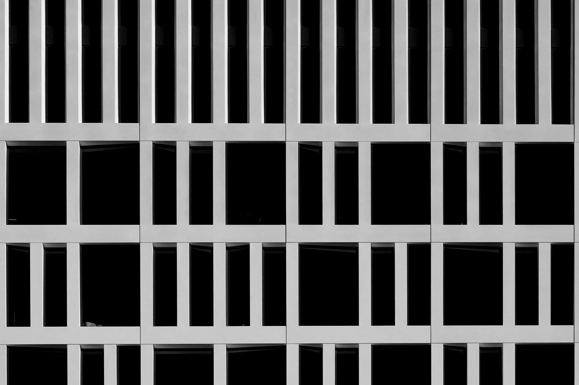 Grayscale repetitive facade pattern.