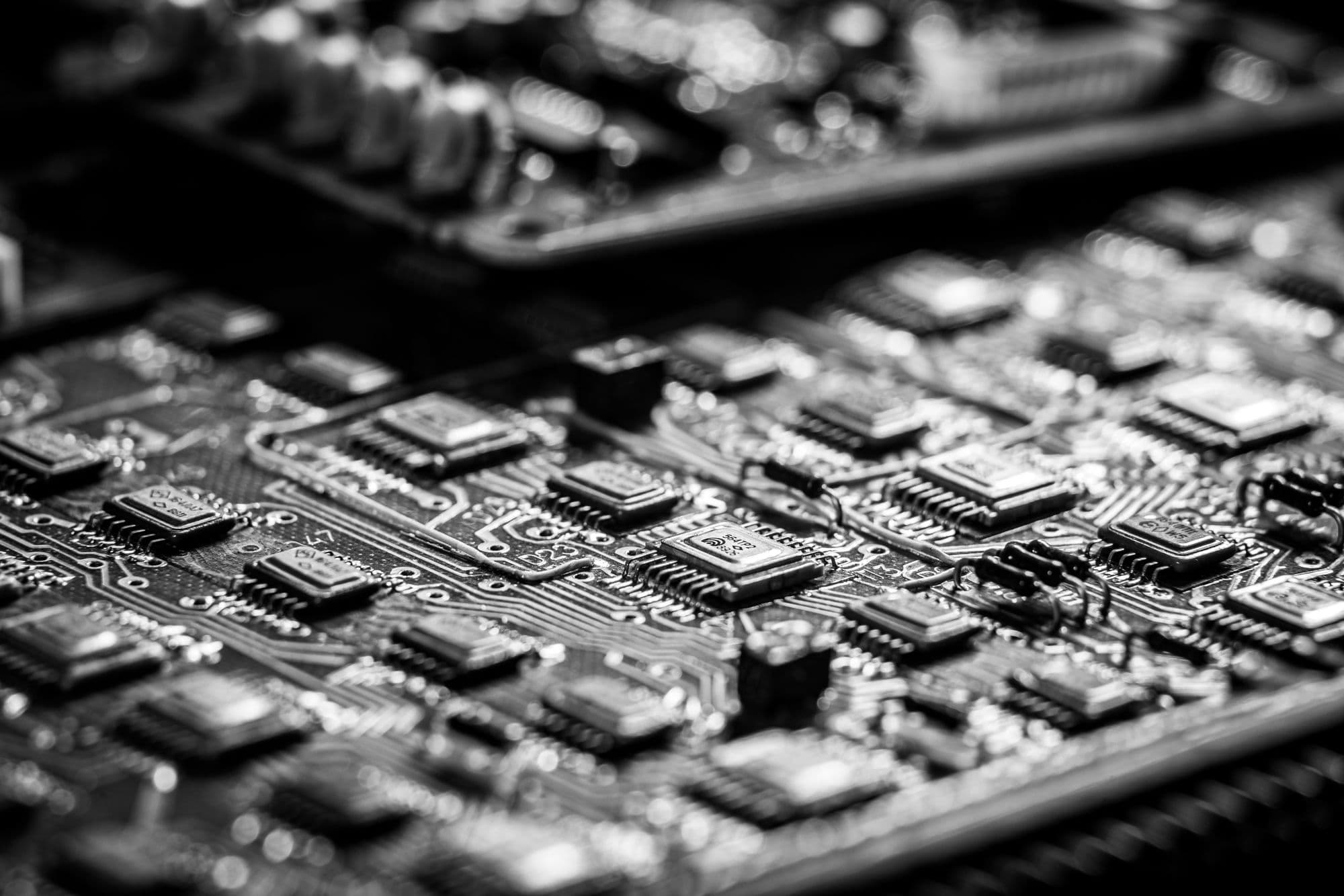 Black-and-white circuit-board detail.